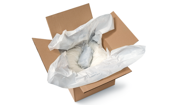 A cardboard box containing a product and foam packaging