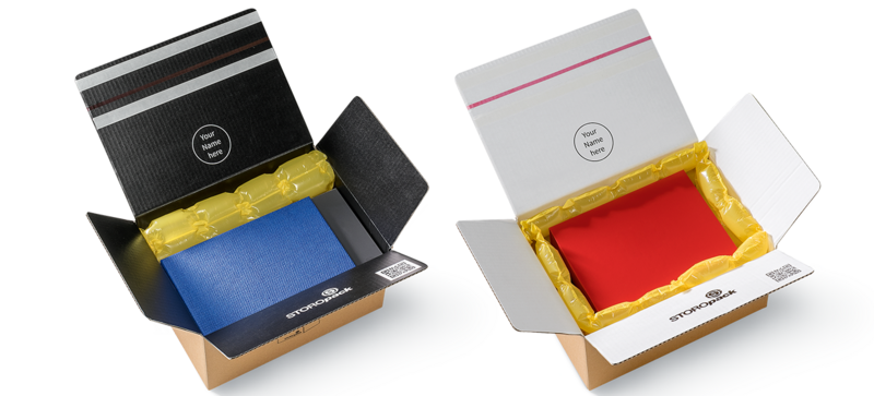 Two cardboard boxes containing colored boxes and yellow air cushions